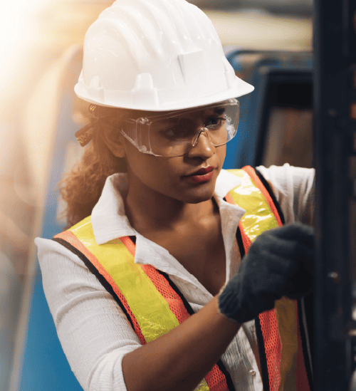 female engineer working on machine
